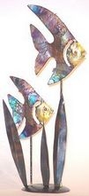 Tin coppered wall and table art animals, fish and southwest themed wall and table dÃ©cor.